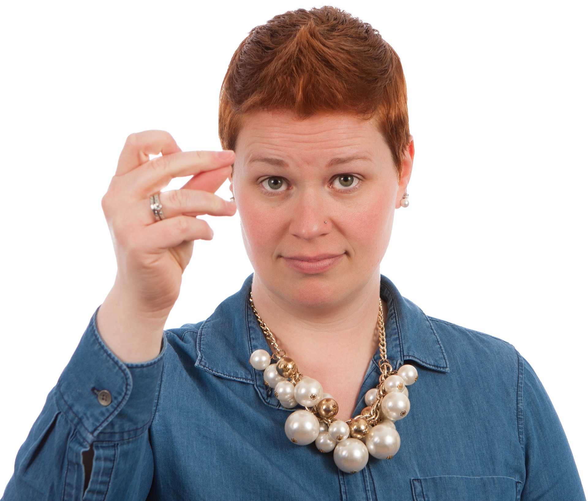 lady looking at camera while she gets ready to snap her fingers