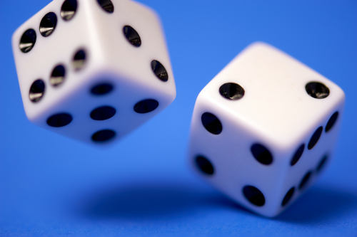 close up of dice being roled