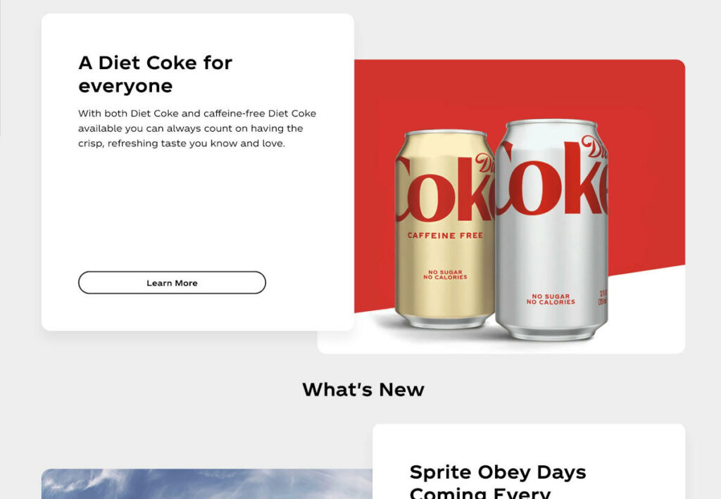 screenshot from CokaCola's website with black and white content to the left of a large image of two coke cans on a red background